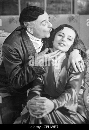 Ralph Arthur Roberts und Gina Falkenberg in "Der Mann Mit Den Angegrauten Schlaefen" [der Mann mit den grauen Schläfen] Stockfoto