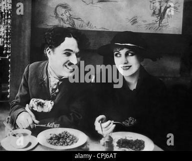 Charles Chaplin und Edna Purviance in "Einwanderer", 1916 Stockfoto