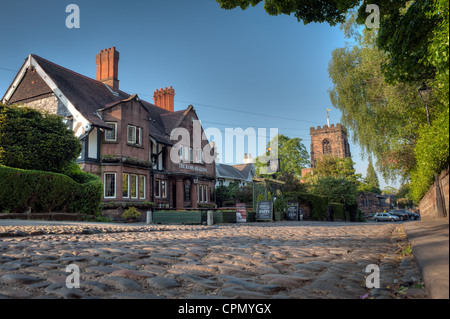 Die Rams Kopf Gastwirtschaft in Grappenhall Dorf, Warrington, Cheshire, England. Ein malerisches Dorf mit einer Kirche, einer gepflasterten Straße und zwei pubs Stockfoto