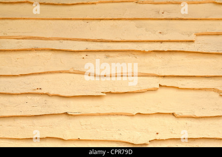Holzstruktur - Landschaftsblick auf einem rustikalen und abgenutzt aus Holz Hintergrund, lackiert gelb. Stockfoto
