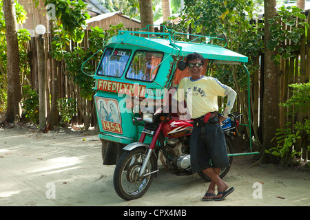 Dreirad-Fahrer, Siquijor, die Visayas, Philippinen Stockfoto