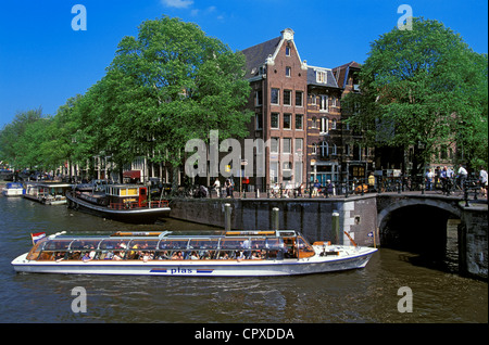 Niederlande, Amsterdam, Fluss Bootsfahrt auf dem Kanal Stockfoto