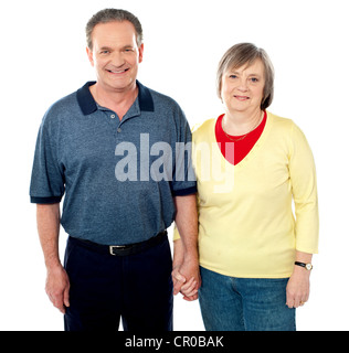 Senior Liebespaar posiert mit einher. Studio gedreht Stockfoto
