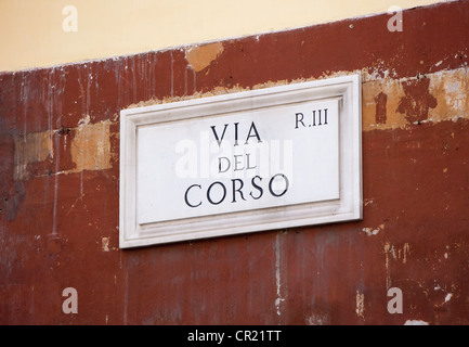 Via del Corso Schild an Wand Stockfoto