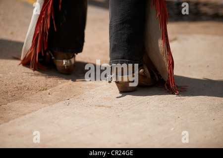 Cowboy-Stiefel, Sporen und Chaps an der Calgary Stampede Stockfoto