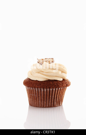 Cupcake mit Erdnussbutter Creme Stockfoto