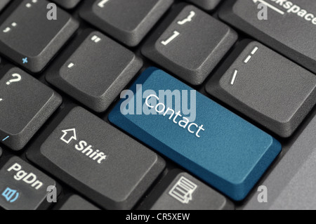 Kontaktieren Sie auf Tastatur Stockfoto