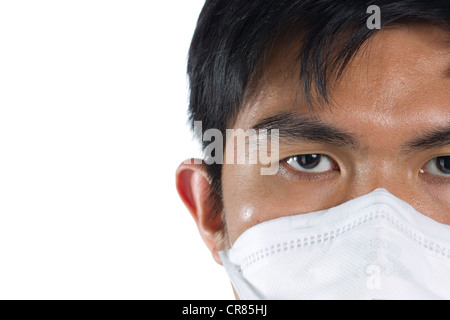 Close-up Portrait eines Mannes einen Mundschutz tragen Stockfoto