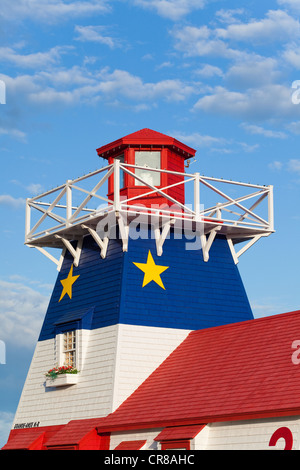 Kanada, New Brunswick, Acadia, Grande Anse, der Leuchtturm in den Farben der Acadia Stockfoto
