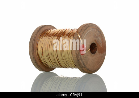 Alten Thread Garnrolle golden Stockfoto