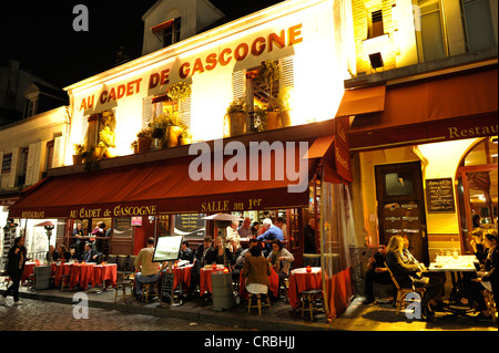 Restaurant Au Cadet de Gascogne nachts, Place du Tertre, Montmartre, Paris, Frankreich Stockfoto