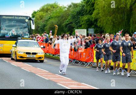 Olympic Torch Relay-Team 2012 läuft durch Stockton on Tees Stockfoto