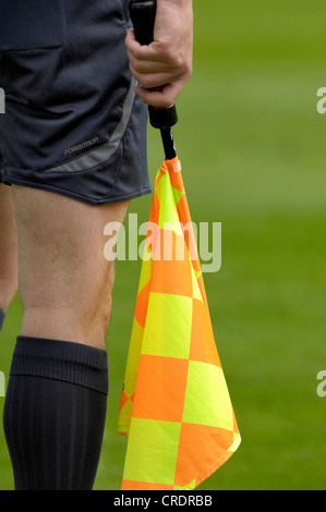 der Linienrichter Bein und Flagge Stockfoto