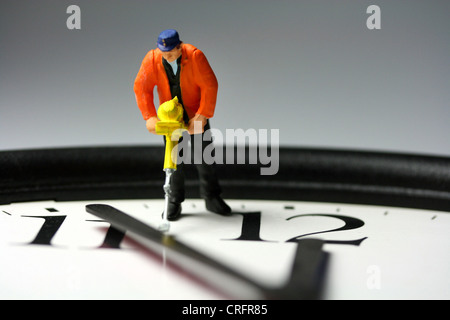 Bild 11:55, arbeitet Mann-Symbol Stockfoto