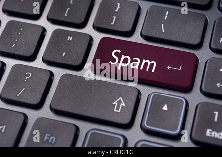 Spam-Email-Konzepte mit Nachricht auf enter-Taste der Computertastatur. Stockfoto