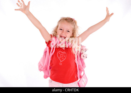 optimistische Schulmädchen ist gerne zur Schule gehen Stockfoto