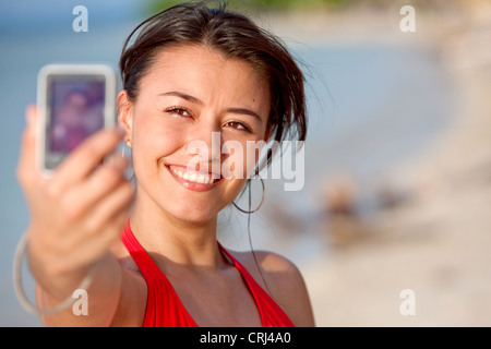 junge attraktive Frau, die ein Selbstporträt Stockfoto