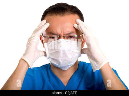 betonte Krankenpfleger mit Kopfschmerzen Stockfoto