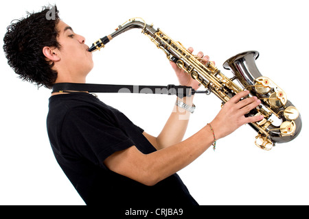 Junge spielt Saxophon Stockfoto