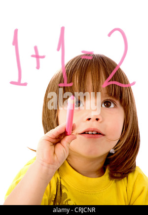 Junge im Grundschulunterricht Mathematik Stockfoto