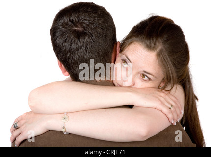 paar, umarmen, während die Frau Lokoing entfernt, in gewissem Sinne nachdenklich ist Stockfoto
