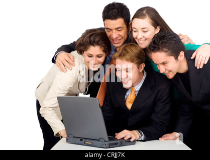 Business-Team in einer Büro-Laptop-Computer - treffen Stockfoto