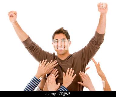 Glücklicher Mann mit weiblichen Hände über ihn Stockfoto