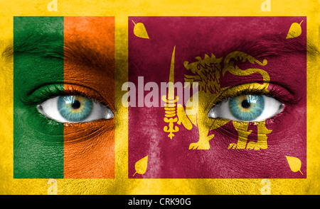 Menschliches Gesicht gemalt mit Flagge von Sri Lanka Stockfoto