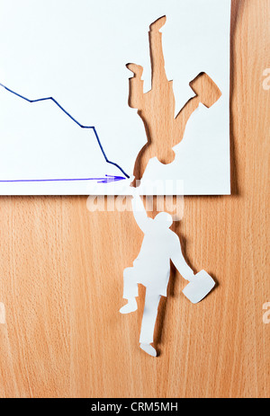 Das Konzept-Bild, werden das Papier Person versucht gehalten werden. Stockfoto