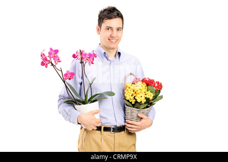 Junger Mann mit Blumen, isoliert auf weißem Hintergrund Stockfoto