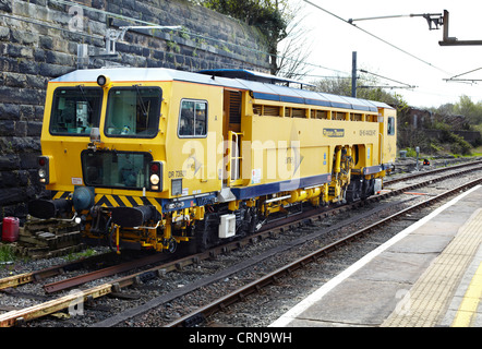 Plasser & Theurer verfolgen Stopfmaschine in Lancaster station Stockfoto