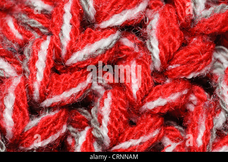 Rote und weiße Wolle Textur gestreift. Es kann als Hintergrund verwendet werden. Stockfoto