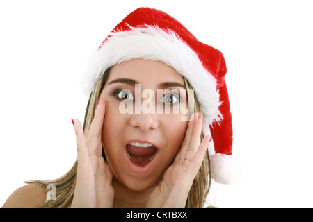 Frau in Nikolausmütze Weihnachten überrascht. Stockfoto