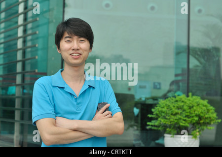 zuversichtlich junger chinesischer Unternehmer Stockfoto