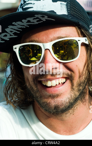 Mann in Poppies 1, Kuta, Bali, Indonesien Stockfoto