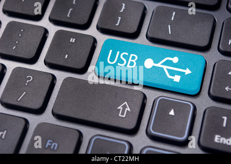 USB-Zeichen auf enter-Taste der Tastatur, für Konzepte der Geräte bereit. Stockfoto