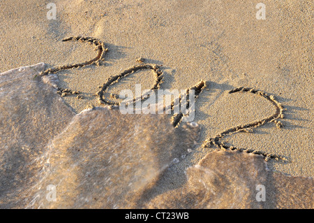 geschrieben am Sand vom Meer ausgewaschen wird 2012 Stockfoto