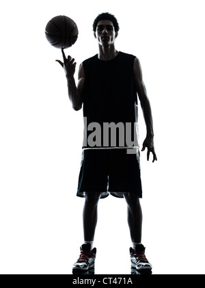 ein junger Mann-Basketball-Spieler-Silhouette im Studio isoliert auf weißem Hintergrund Stockfoto
