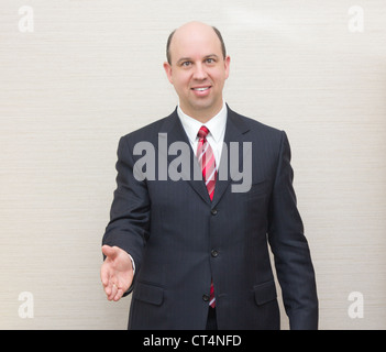 Business-Mann mit einem Händedruck. Stockfoto