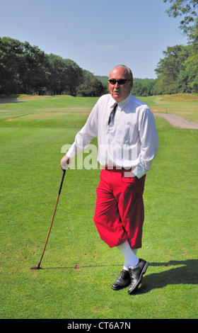 Greg Wall, Golf Direktor am Golfplatz Pocono Manor schlägt eine entspannte Haltung Stockfoto