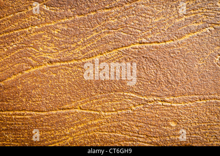 Gelber Stein Hintergrund mit Adern durchzogen. Lose Textur, Detail und Kopie. Stockfoto