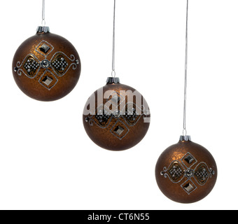 drei goldene Weihnachtskugeln, isoliert auf weiss Stockfoto