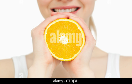 Nahaufnahme einer Frau mit einer orange Stockfoto