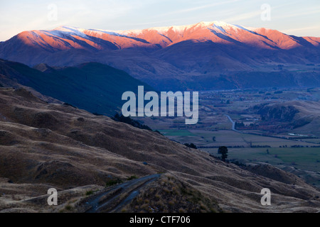 Letzten Sonnenstrahlen Sonnenuntergang über die Remarkables, Queenstown, Neuseeland 2 Stockfoto