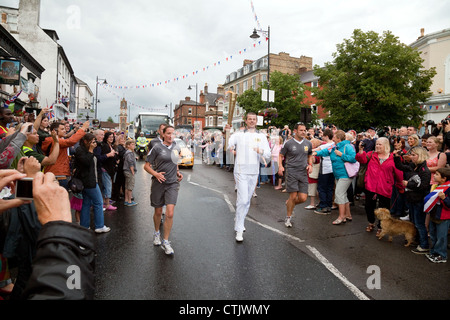 Die 2012 Olympic Torch Relay, High St, Newmarket Suffolk East Anglia UK Stockfoto