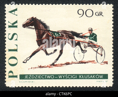 Polen - CIRCA 1967: Eine Briefmarke gedruckt in Polen zeigt eine kombinierte Fahrt, Serie Pferdesport, circa 1967 Stockfoto