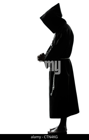 ein kaukasischer Mann Priester beten Silhouette im Studio isoliert auf weißem Hintergrund Stockfoto