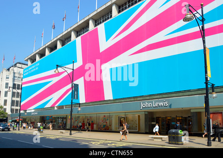 John Lewis-Kaufhaus in der Oxford Street, eingehüllt in eine Riesen große Anschluß-Markierungsfahne, den Status der Geschäfte in London 2012 zu fördern Stockfoto