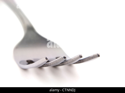 Silberne Gabel Utensil mit flachen DOF isoliert auf weißem Hintergrund mit textfreiraum Makro. Stockfoto