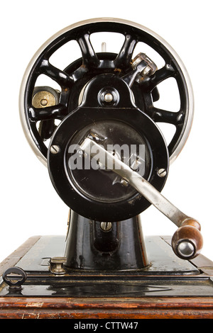 Drehgriff eine alte antike Nähmaschine auf weiß Stockfoto